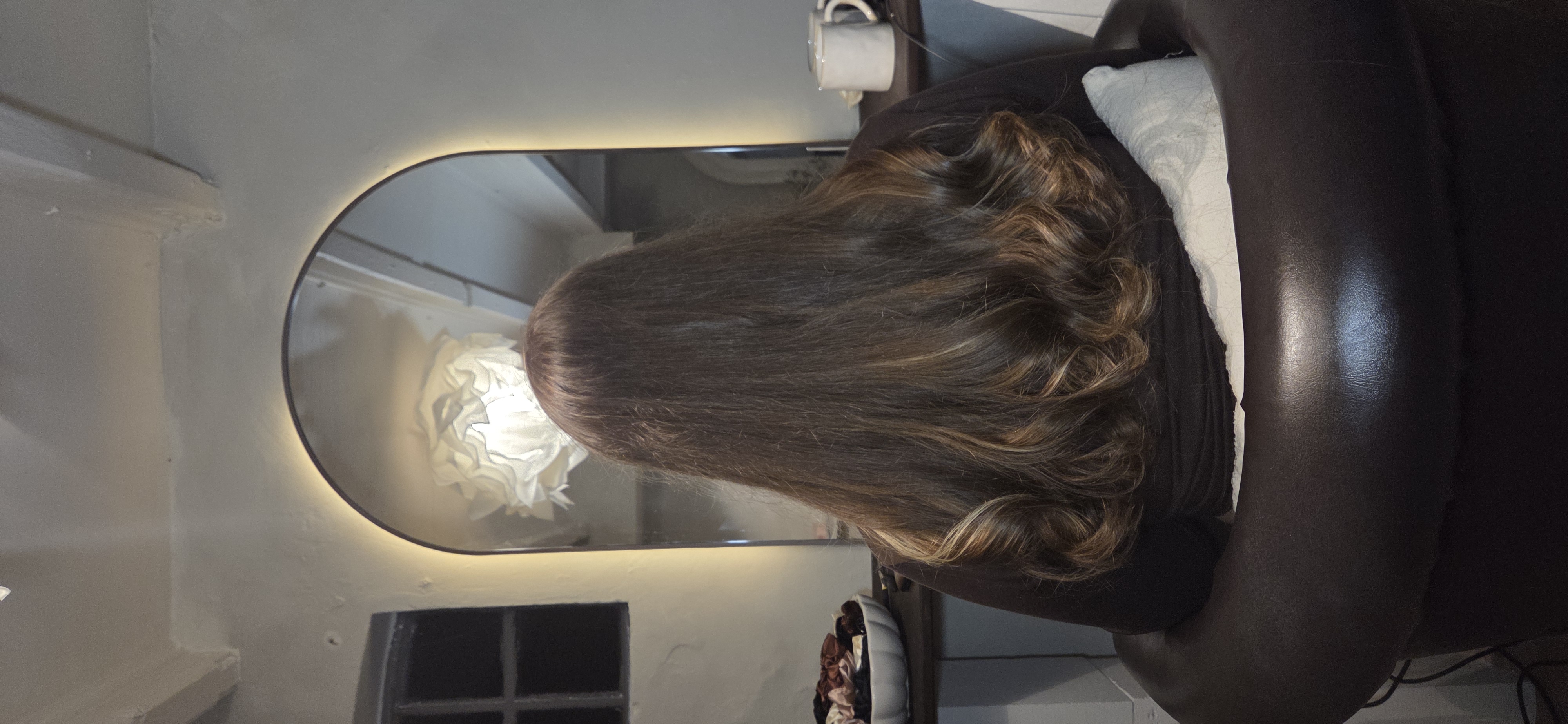 Resultaat hair extensions — donker bruin met krullen